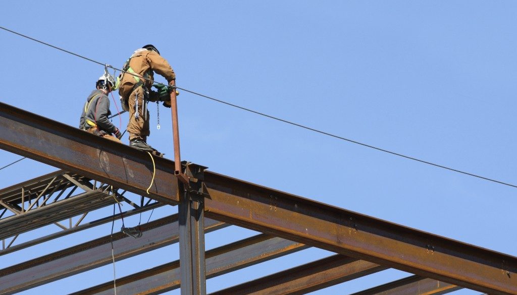 workers dangerous harm safety metal construction