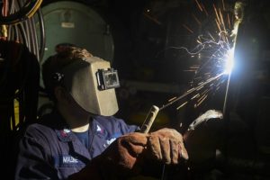 welder welding flames worker safety mask metal flame fire