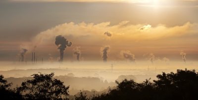 burning coal smog smoke ozone layer hazardous factory train mountains pollution